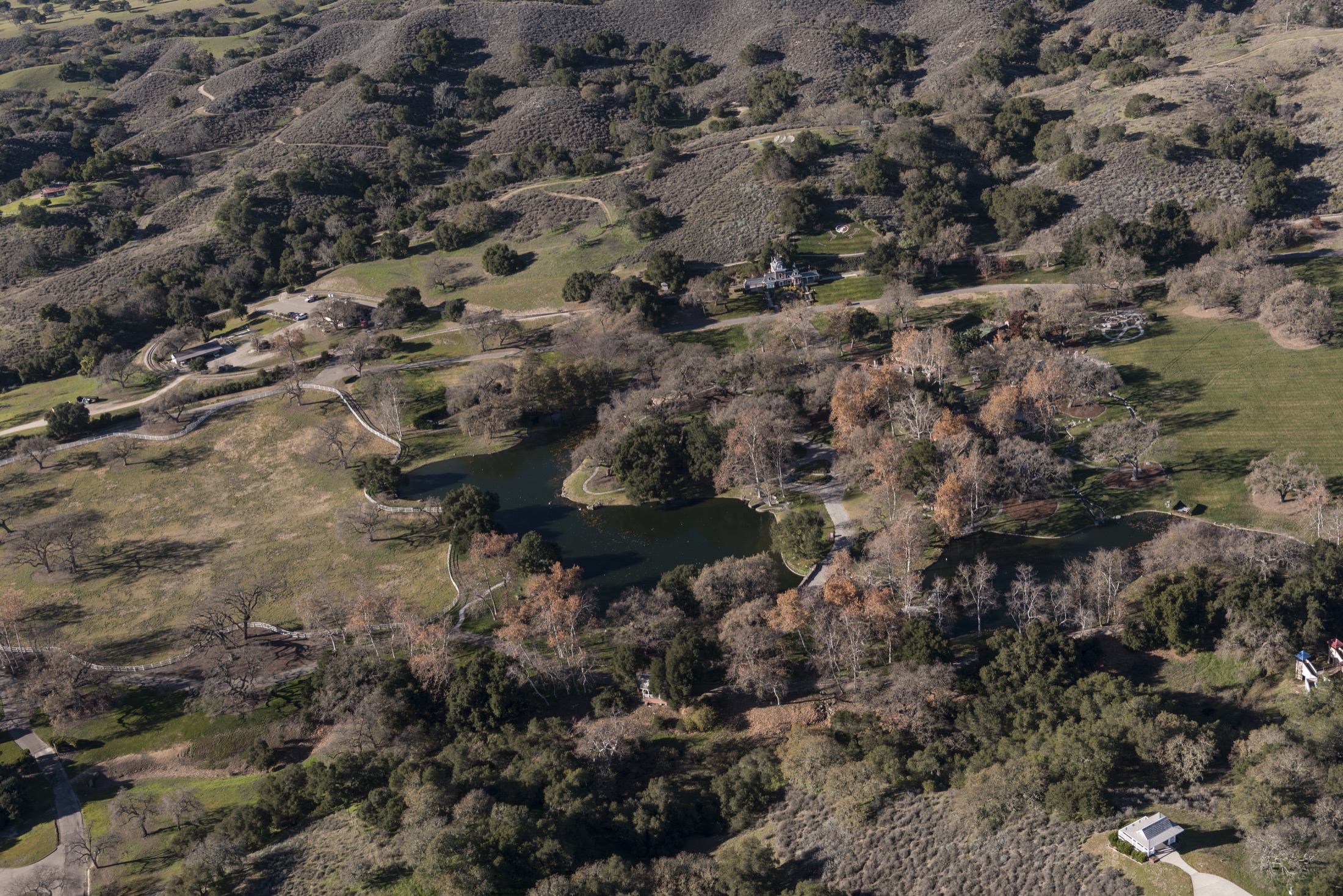 Aerial view of the Neverland Ranch grounds, lake and oak woodland in the Santa Ynez Valley